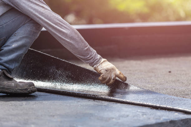 Professional Waterproofing technician working in Roseville, MN